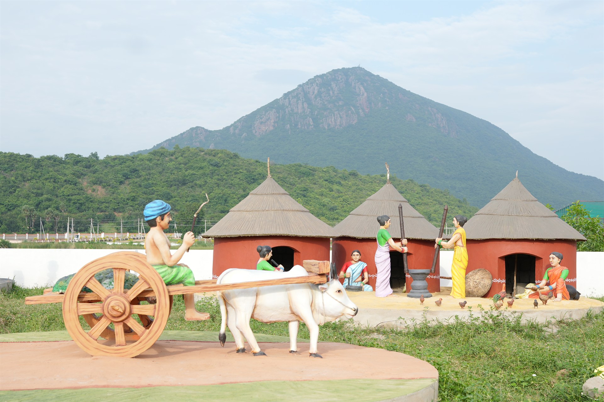 Farmer with Oxen Plowing Sculpture